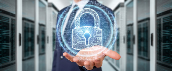 Fototapete - Businessman protecting his datas with digital security hologram 3D rendering