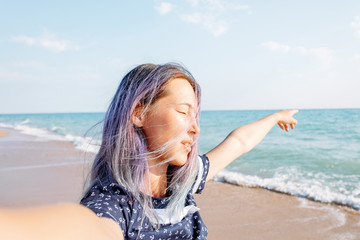 Wall Mural - Woman resting on beach vacations.