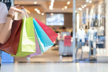 Closeup Of Woman Holding Shopping Colorful Of Shopping Bags At Shopping Mall With Copy Space - Shopping Concept