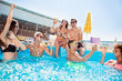 Diversity couples students recreation entertainment careless glasses eyewear delightful people concept.  Excited cheerful joyful relaxed teen youth celebrating summer season moving in blue clear pool