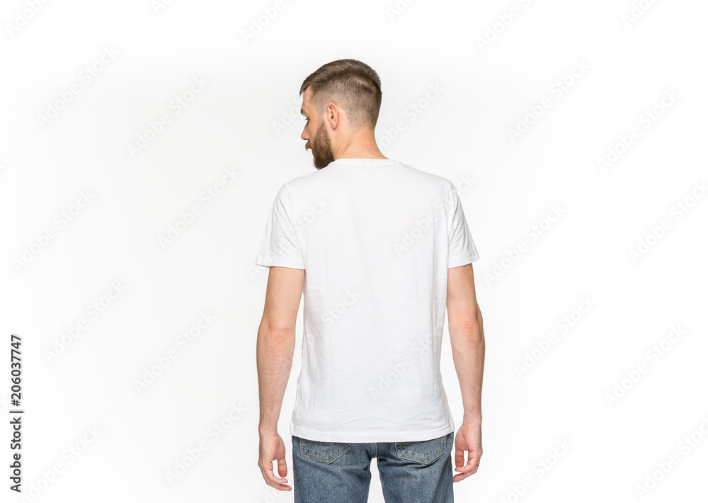 Closeup of young man's body in empty white t-shirt isolated on white background. Mock up for disign concept