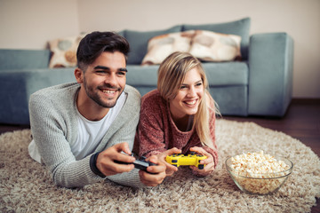 Sticker - Young couple playing video games