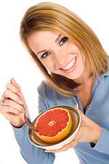 Healthy: Pretty Woman Eating Grapefruit