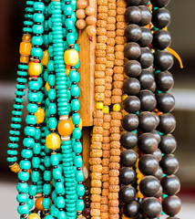 Wall Mural - Colorful souvenirs of precious stones, Luang Prabang, Laos. Close-up.