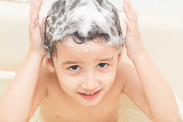 boy 4 years old bathed in the bathroom