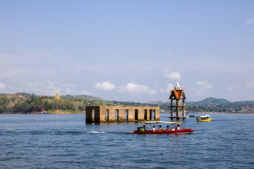 View of Boat for travel on the river with The Underwater Temple kanchanaburi thailand