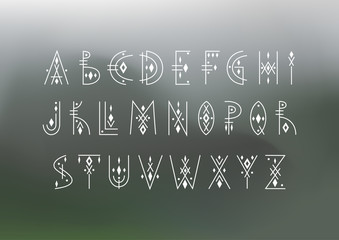 Poster - Vector alphabet set. Capital letters in geometric indigenous style on a blurred background. For hipster theme, trendy posters.