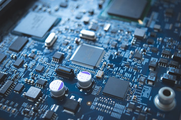 Computer board chip circuit cpu core blue technology background or texture with processors microelectronics hardware concept electronic device motherboard semiconductor