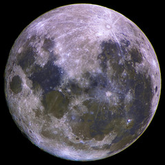 Wall Mural - upside down super moon isolated in dark background space, with its natural mineral colors, taken by 