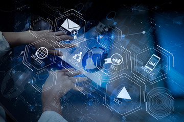 Aufkleber - top view of businessman hand working with modern technology and digital layer effect as business strategy concept