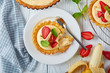 tartlet with strawberries on a plate