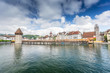 © A_Skorobogatova - View of the old wooden bridge Capelbrucke in Lucerne.