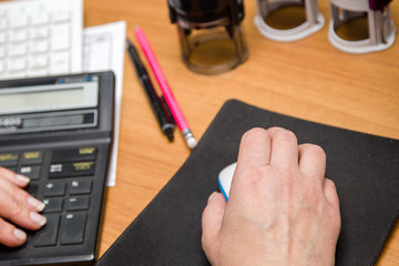 computer mouse in hand