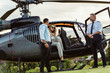 Couple traveling by a private helicopter