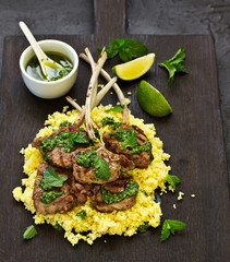 Canvas Print - Lamb chops on bone, with mint-garlic sauce and couscous.