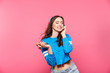 © veles_studio - Pretty young girl posing at pink background