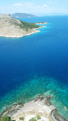 Aerial drone bird's eye view photo of port and traditional fishing village of Perdika in island of Aigina, Saronic Gulf, Greece