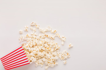 Bucket of popcorn on white background