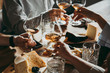 © FornStudio - Friends toasting during meal