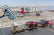 security CCTV camera or surveillance system with airport tarmac on blurry background