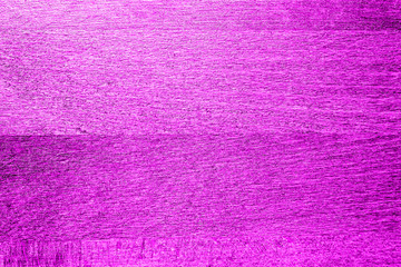 Purple close-up textured wood background.