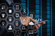 © everythingpossible - businessman hand using tablet computer and server room