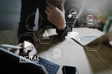 Aufkleber - Website designer working digital tablet dock keyboard and computer laptop with smart phone and graphics design diagram on mable desk as concept