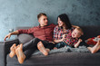 © teksomolika - Happy family on the couch