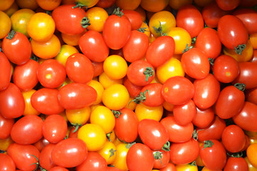 Pile of tomatoes for sale in local market.