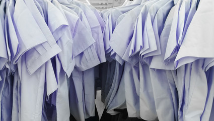 thai white boy and girl student uniform on rack