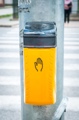 Wall Mural - Electronic device sensor on the pole of the traffic light for pedestrians to turn green signal on the crosswalk, safety technology concept