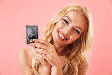 Cheerful Blonde Woman In Dress Holding Credit Card