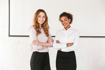 Canvas Print - Two smiling young business women