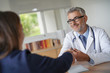 © goodluz - Doctor and patient shaking hands