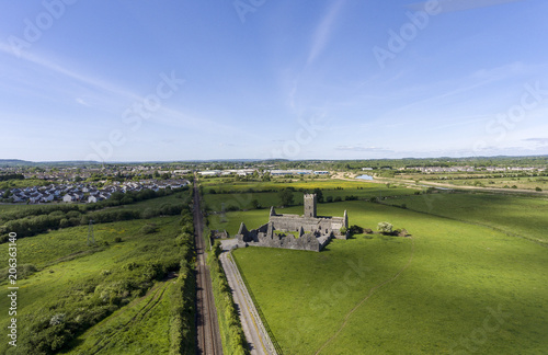 Beautiful aerial birds eye view scenic old ruins of Clare Abbey in County Clare, Ireland плакат