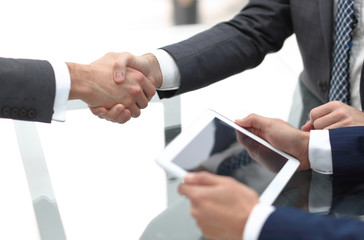 close up.handshake of new business partners