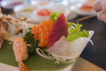 closeup of chinese food with sushi prepared and decorated in different ways 3