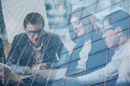 Fotografie, Obraz Businessmen that work together in office