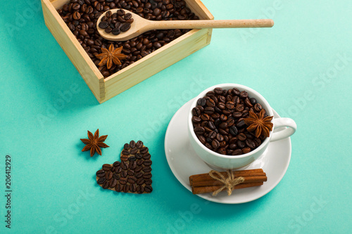 Fotografie, Tablou Wooden box spoon with coffee seeds cup of coffee hearts