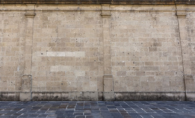 Old Stone Castle Wall by a Old Stone Street