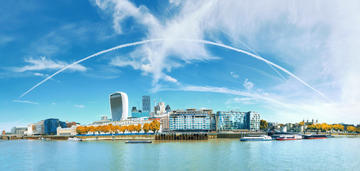 Wall Mural - Panoramic image of the office block construction on the bank of river Thames in London, UK