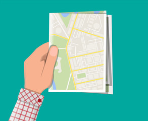 Poster - Folded paper city map in hand