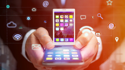 Poster - Businessman using a smartphone with a tablet surrounding by app and social icon - 3d render