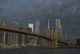 Fototapeta Miasta - Brooklyn view of Manhattan skyline and Brooklyn Bridge on moody morning