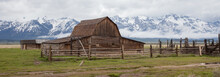 Log Cabin Barn In Front Of Mountains In The Grand Teton National Park
