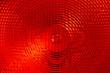 Abstract background of red faceted plastic