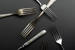© The Picture Pantry - Vintage metallic cutlery and kitchen utensils on gray background