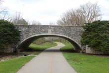 The Stone Bridge On The Parks Pathway.
