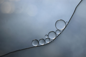 This is an oil and water photograph in blue/grey perfect for backgrounds and cards