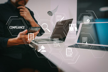Poster - businessman working with smart phone and digital tablet and laptop computer in modern office